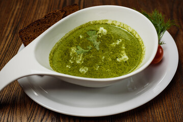 
cream soup with sour cream and dark bread