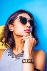 lifestyle people concept. young pretty smiling indian girl with long nails wearing lot of jewelry rings, asian summer happy cool close up