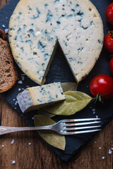 Fourme d'ambert cheese and bread with cherry tomato