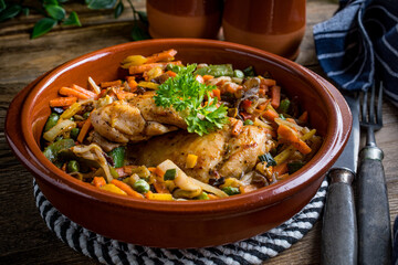 Fried chicken fillet with vegetables.