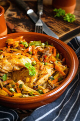 Fried chicken fillet with vegetables.