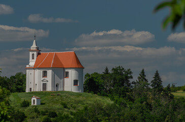 Fototapeta na wymiar Chapel of Saint Antonin over Dolni Kounice village in south Moravia summer day