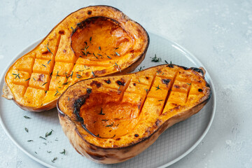 Roasted butternut squash pumpkin with thyme herb