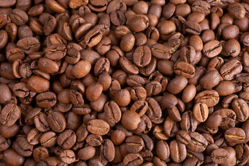 Roasted coffee beans closeup. background. Copy space