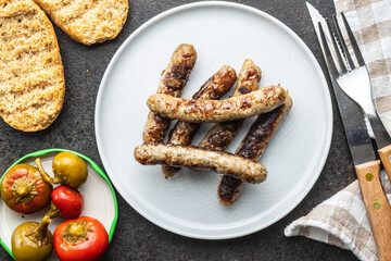 Grilled white sausages.
