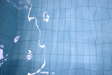 surface of swimming pool,background of water in swimming pool.