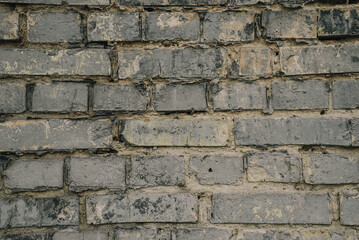 antique vintage brick wall painted in gray