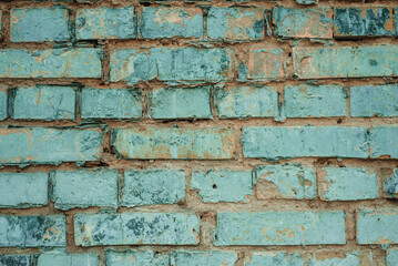 antique vintage brick wall painted in blue