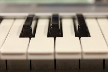 row of black and white piano keys on a Piano keyboard.