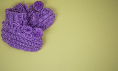 Children's toys and clothes on a yellow background