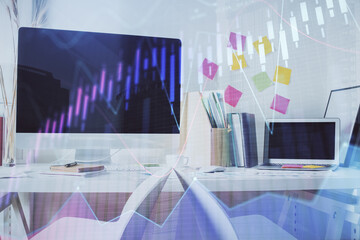 Double exposure of financial graph drawing and office interior background. Concept of stock market.