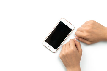 Cell phone hand. Cellphone with space for text. Woman holding smartphone in female hand with empty blank screen isolated on white background. Game play mobile concept.