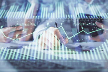 Double exposure of man and woman working together and technology theme drawing hologram. Big data concept. Computer background.