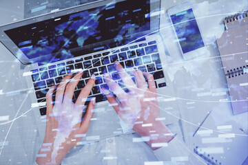 Fototapeta na wymiar Double exposure of woman hands working on computer and data theme hologram drawing. Top View. Technology concept.