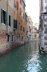 Fototapeta na wymiar Beautiful peaceful scene of canal in Venice, Italy