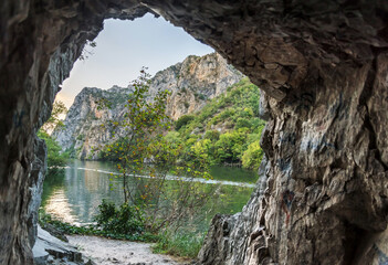 Fototapeta na wymiar Matka Canyon lake and river,cave entrance,near Skopje,Northern Macedonia.