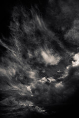 Fototapeta na wymiar dark stormy sky in sepia black and white