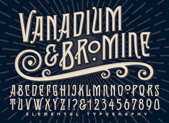 Vanadium and Bromine Alphabet is a Stylized Old World Deco Font Design with a Sunburst Background and Some Alternate Characters
