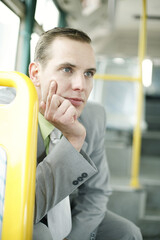 Businessman daydreaming in the train