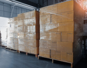 Packaging Boxes Wrapped Plastic Film on Pallets Rack in Storage Warehouse. Supplies. Storehouse Cargo Shipment. Warehouse Shipping Logistics.	