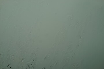 雨の窓ガラス　濡れた　雨　抽象的な