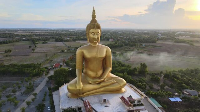 Aerial footage from a drone of the Big Buddha statue at Wat Muang, Ang Thong Province, Thailand