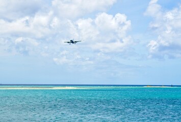 Jet aircraft in final Approach for landing at Caribbean island
