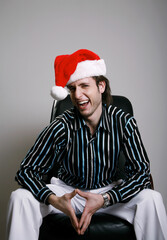 Businessman wearing a Christmas hat