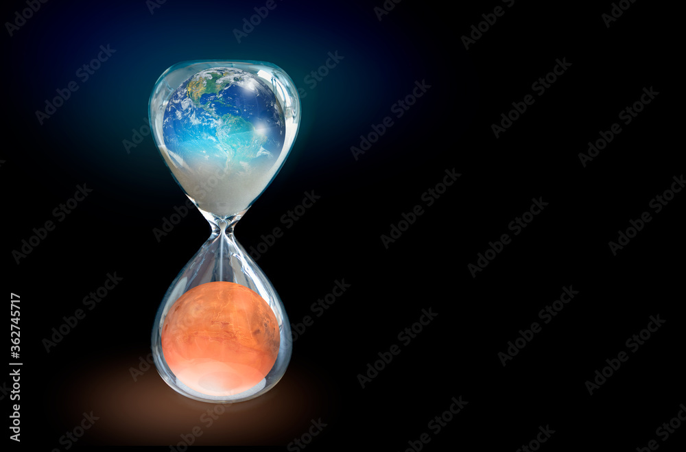 Aufkleber Global warming concept - Planet Earth is becoming a dead planet like Mars - Hourglass inside Planet Earth and Mars isolated on black background 