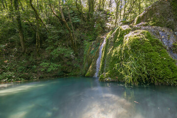 View of natural pool in the wild forest near Castel di Fiori, Terni, Umbria, Italy