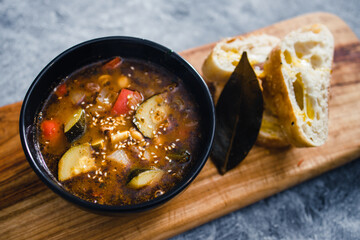 plant-based food, vegan turkish hot pot with mediterranean vegetables and turkish bread