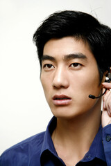 Businessman talking on a telephone headset