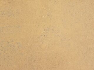 Beige color soil on concrete floor textured background