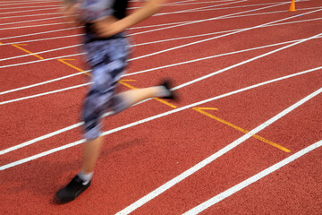 Fototapeta premium legs of a long distance runne