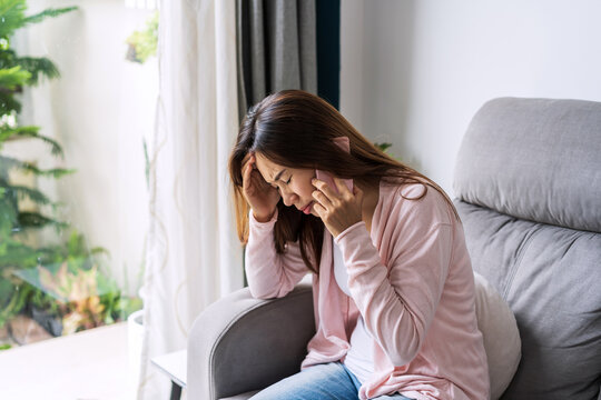 Young Depressed And Stressed Woman Crying And Having Serious Conversation At Home, Negative Emotion And Mental Health Concept