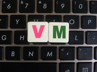 Abbreviation VM (Virtual Machine) on keyboard background