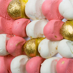 Pink and gold plasticine scale background. Close up texture.