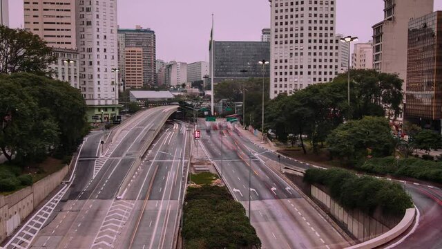 Timelapse of vinte e tres de maio avenue from Cha viaduct, Sao Paulo downtown, day to night, Brazil