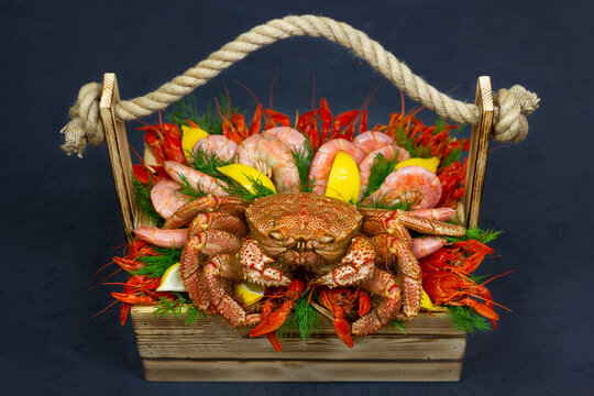 seafood basket, shrimp, crab, crayfish and lemon