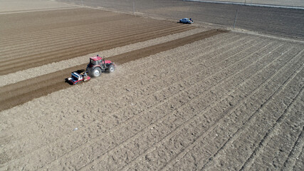 Planter planting peas on farm, North China