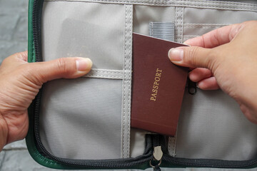 close up woman pull passport book for travel plan