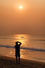 Fototapeta premium A beautiful golden sun rise in puri, odisha, India