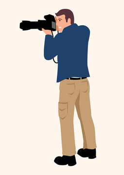 Man using a professional DSLR camera with tele lens
