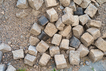 Pile of color natural stone cubes for making outdoor pavement tiles