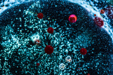 Abstract pattern. Texture for graphic design made with water, oil and dyes. Figures like viruses and cell. Coronavirus, flu and various viruses.