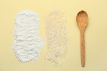 Spoon with rice and flour on color background