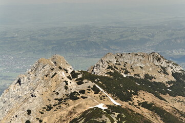 Poland Tatra Mountains. View of the mountain peaks against the backdrop of a sunny sky. Giewont