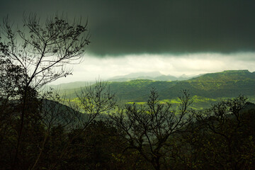 Fototapeta na wymiar Beautiful view of green mountains at way to Mahabaleshwar, maharashtra, india.
