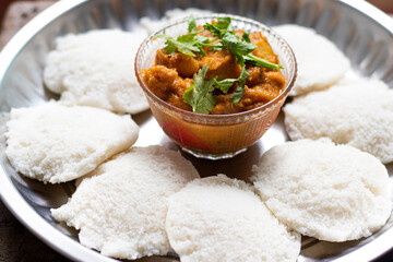 A Idly with spicy dish its a south Indian Breakfast healthy and tasty food