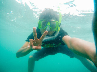 Snorkeling in the middle of the high seas while on vacation